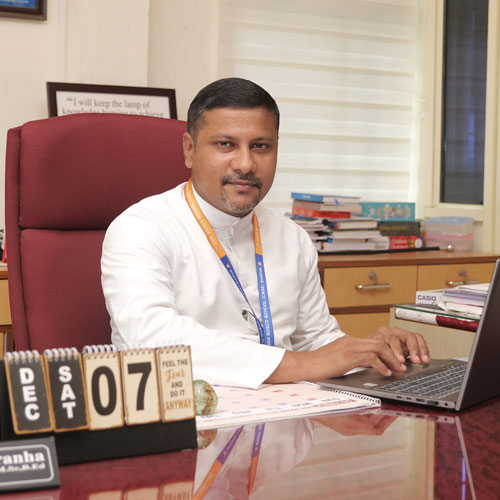 Rev. Fr. Rolwyn Aranha, Principal